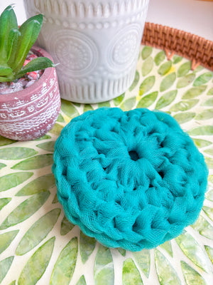 Handmade dish scrubber crafted with care by at-risk women in India, supporting empowerment and sustainable livelihoods.