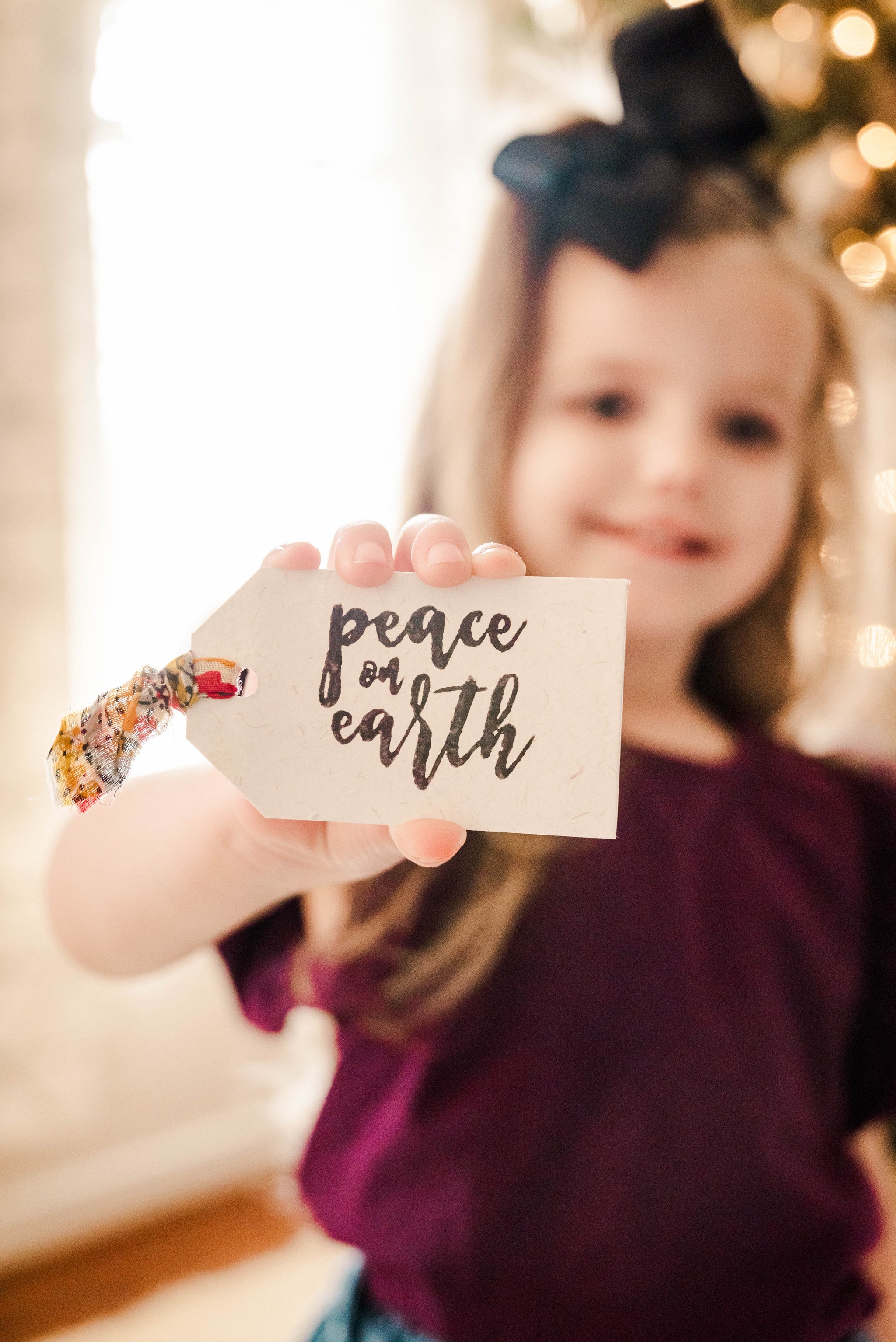 Set of handmade Christmas gift tags featuring unique, festive designs, adding a personal touch to your holiday gifts.