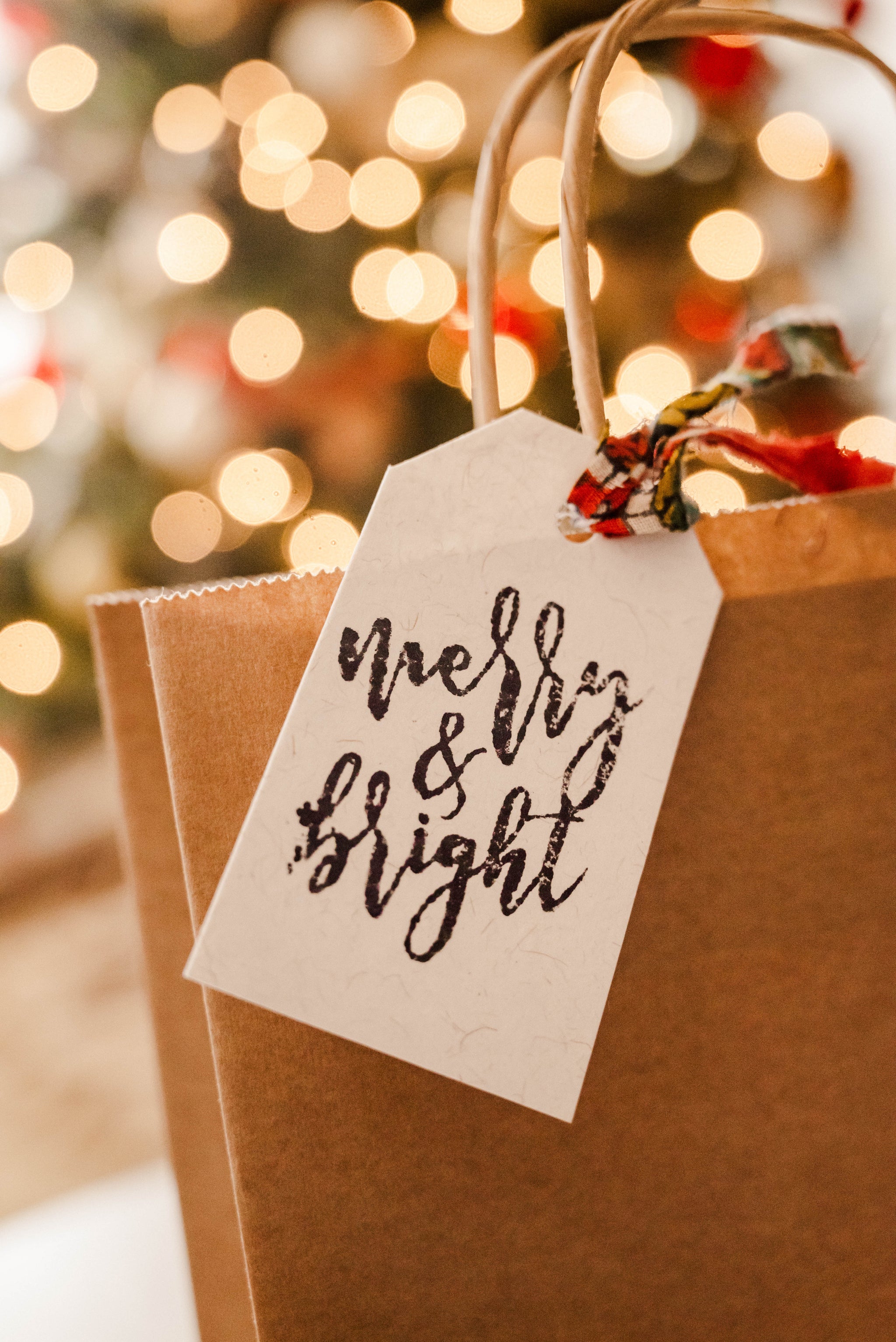 Set of handmade Christmas gift tags featuring unique, festive designs, adding a personal touch to your holiday gifts.