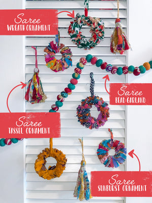 Handmade Christmas ornaments crafted from colorful recycled saree fabric and unique materials, adding a festive, eco-friendly touch to your holiday decor.