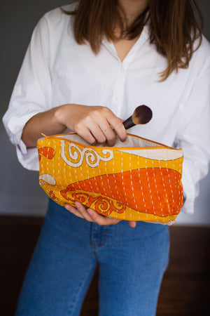 Handmade large Kantha cosmetic bag with vibrant saree patterns, perfect for fitting all your to-go items in one stylish, spacious bag for travel or daily use.