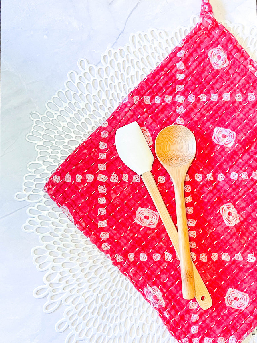 Kantha dish cloths made from hand-stitched, colorful fabric, perfect for eco-friendly cleaning and adding a vibrant touch to your kitchen during the Christmas Season. 