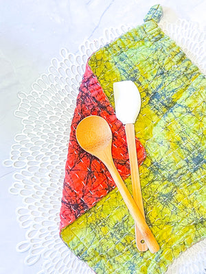 Kantha dish cloths made from hand-stitched, colorful fabric, perfect for eco-friendly cleaning and adding a vibrant touch to your kitchen during the Christmas Season. 