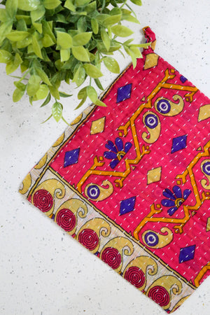 Kantha dish cloths made from hand-stitched, colorful fabric, perfect for eco-friendly cleaning and adding a vibrant touch to your kitchen during Valentines.