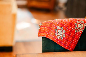 Kantha kitchen towels made from hand-stitched, colorful fabric, perfect for adding an eco-friendly and vibrant touch to your kitchen while offering practical use.