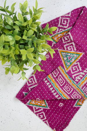 Kantha kitchen towels made from hand-stitched, colorful fabric, perfect for adding an eco-friendly and vibrant touch to your kitchen while offering practical use.