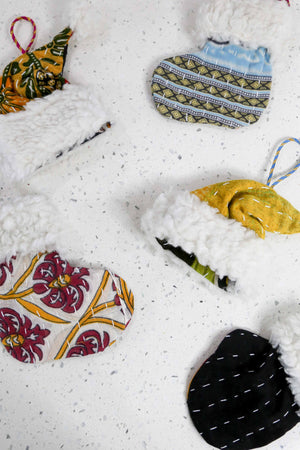 Hand-stitched Kantha stocking, mitten, and Santa hat ornament with a wool cuff. Available in bold colors, ideal for hanging on Christmas trees.