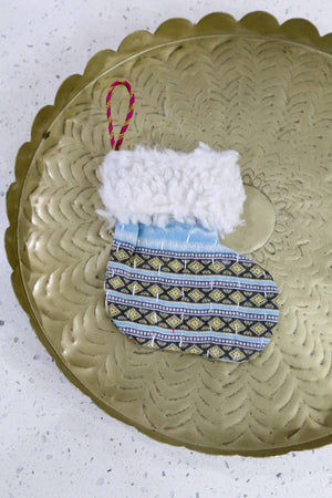 Hand-stitched Kantha stocking ornament with a wool cuff. Availabl in bold colors, ideal for hanging on Christmas trees.