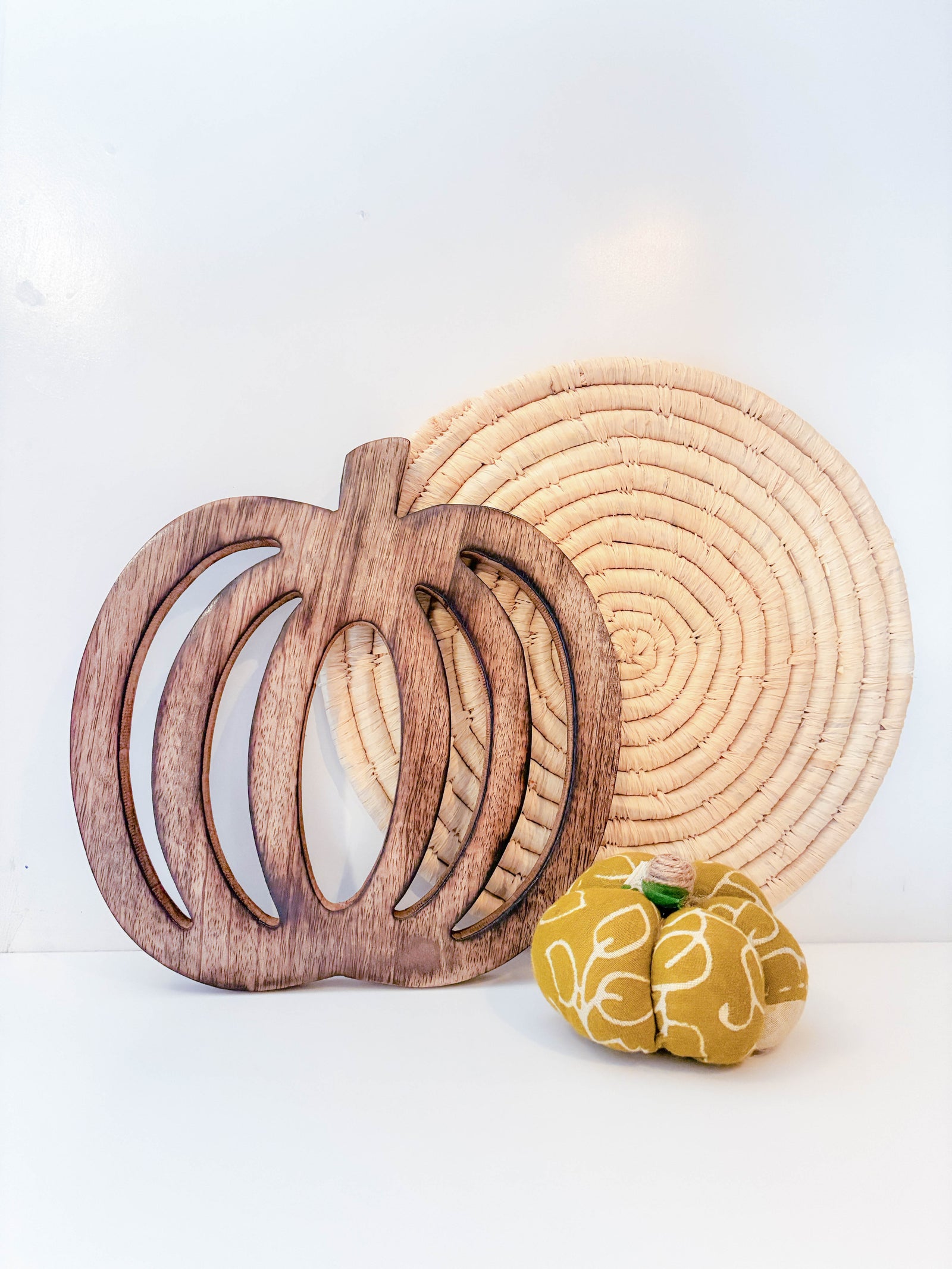 Hand carved wooden pumpkin trivet for fall kitchen decor, sustainable mango wood. Farmhouse decor