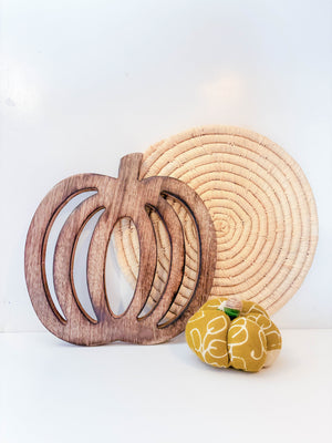 Hand carved wooden pumpkin trivet for fall kitchen decor, sustainable mango wood. Farmhouse decor