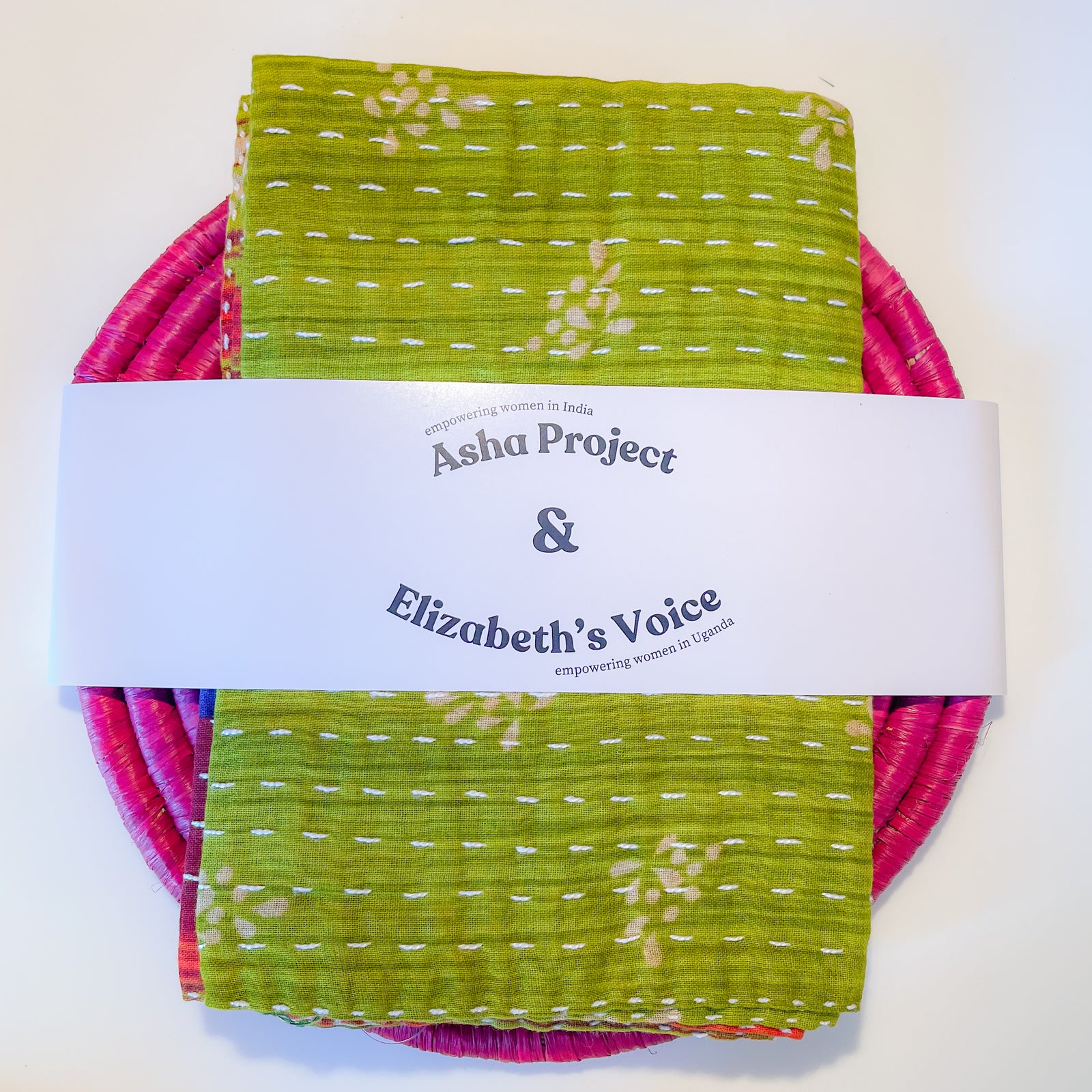 Handmade Kantha kitchen towel paired with a banana leaf trivet, featuring vibrant fabric patterns and eco-friendly materials, perfect for adding a colorful and functional touch to your kitchen.