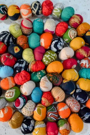 Hand-stitched Saree Bead Garland featuring vibrant, multicolored beads strung together, creating a beautiful and colorful decorative piece for home decor