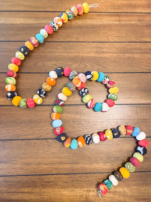 Hand-stitched Saree Bead Garland featuring vibrant, multicolored beads strung together, creating a beautiful and colorful decorative piece for home decor