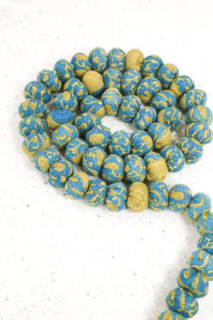 Handmade saree bead garland featuring a single pattern saree, with vibrant beads and intricate details, perfect for adding a colorful, traditional touch to your decor.