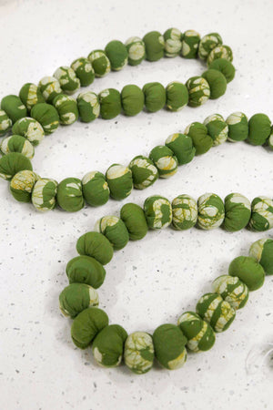 Handmade saree bead garland featuring a single pattern saree, with vibrant beads and intricate details, perfect for adding a colorful, traditional touch to your decor.