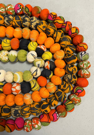 Hand-stitched Saree Bead Garland featuring vibrant, multicolored beads strung together, creating a beautiful and colorful decorative piece for home decor.