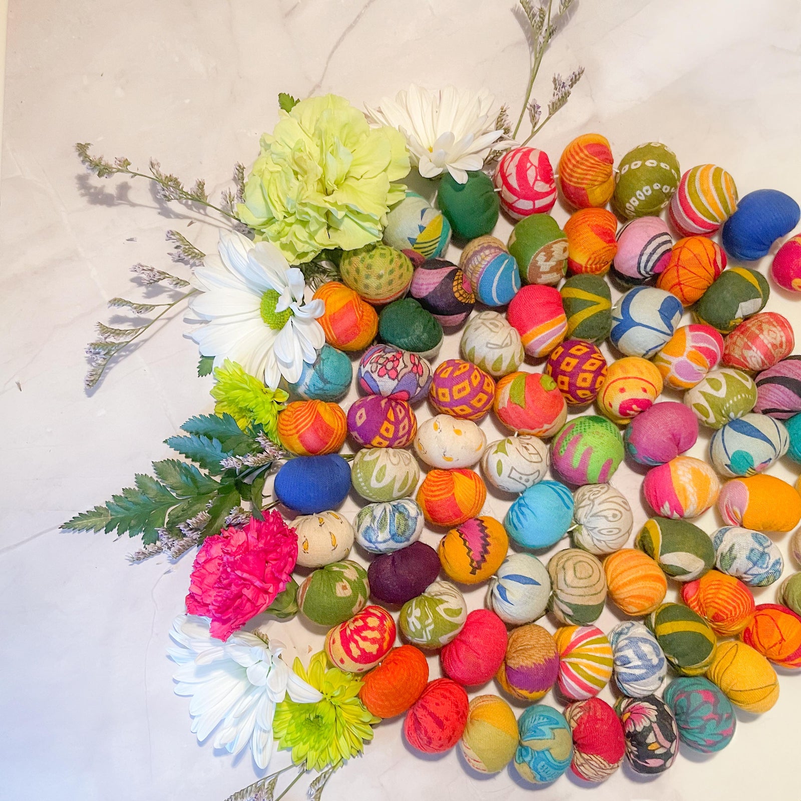 Each garland is handmade with love and care, transforming vibrant saree fabric into a colorful, eco-friendly decoration. A perfect way to add a touch of charm, meaning, and sustainability to your celebrations, these garlands bring a unique, heartfelt flair to any space. Whether draped over furniture or hung as an accent, they’re a beautiful way to infuse color and purpose into your holiday decor!