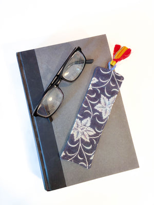 Saree-inspired bookmark with intricate patterns and vibrant fabric, adding a touch of traditional elegance to your reading experience