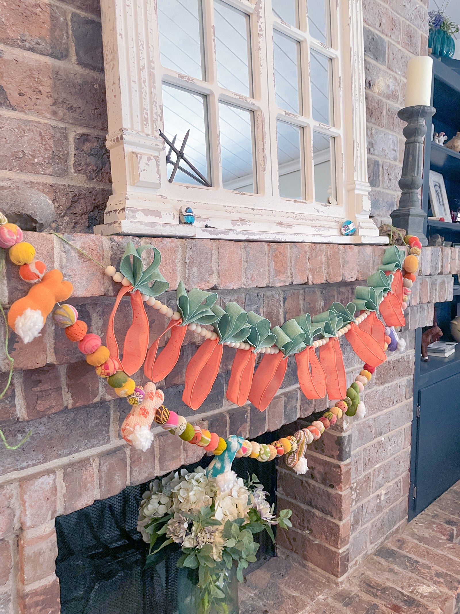 Handmade recycled saree Easter garland featuring vibrant hand-stitched beads and adorable bunnies with fluffy tails, perfect for adding a festive and eco-friendly touch to your Easter decor.