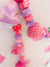 Saree heart garland made from colorful, recycled saree fabric hearts, strung together with Saree beads to create a vibrant and eco-friendly decoration for home or special occasions.