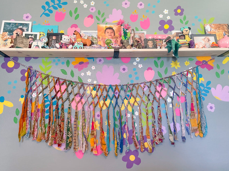 Handmade Saree Macrame Banner, crafted from colorful saree strips, intricately hand-tied to create a unique and vibrant wall decor piece. Perfect for adding a touch of elegance, boho vibes, and cultural flair to any space.