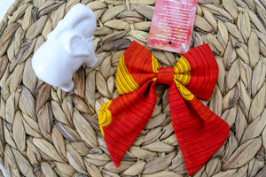 Saree pet bow made from colorful, hand-stitched recycled saree fabric, adding a vibrant and stylish touch to your pet's outfit