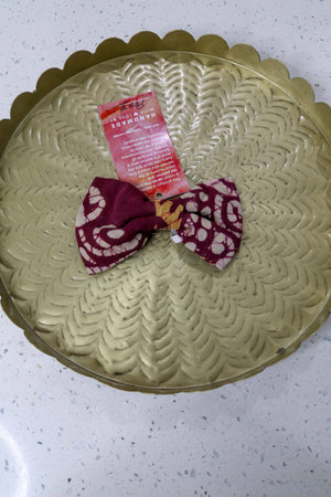 Saree pet bowtie made from colorful, hand-stitched recycled saree fabric, adding a unique and stylish accessory to your pet's wardrobe.