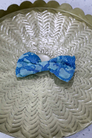 Saree pet bowtie made from colorful, hand-stitched recycled saree fabric, adding a unique and stylish accessory to your pet's wardrobe.