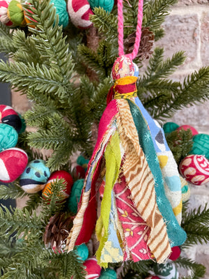 Handmade Saree Tassel Ornament crafted from colorful saree scraps, adding a vibrant and unique touch to your Christmas tree with its playful and elegant design