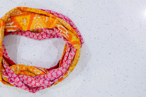 Handmade Kantha infinity scarf with vibrant stitching and beautiful saree patterns, offering a stylish and cozy accessory for year-round wear.