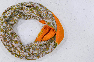 Handmade Kantha infinity scarf with vibrant stitching and beautiful saree patterns, offering a stylish and cozy accessory for year-round wear.