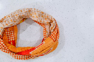 Handmade Kantha infinity scarf with vibrant stitching and beautiful saree patterns, offering a stylish and cozy accessory for year-round wear.