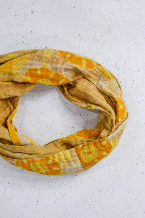 Handmade Kantha infinity scarf with vibrant stitching and beautiful saree patterns, offering a stylish and cozy accessory for year-round wear.