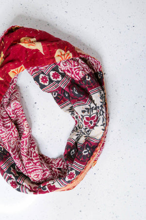 Handmade Kantha infinity scarf with vibrant stitching and beautiful saree patterns, offering a stylish and cozy accessory for year-round wear.