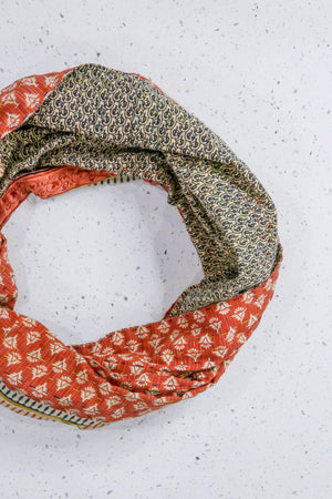 Handmade Kantha infinity scarf with vibrant stitching and beautiful saree patterns, offering a stylish and cozy accessory for year-round wear.