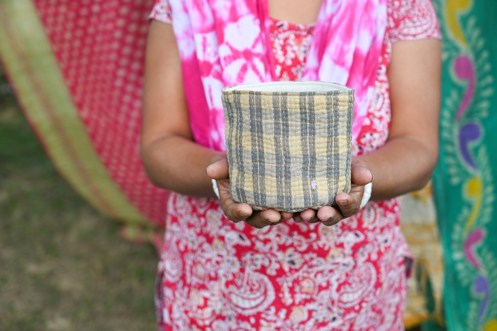Vintage Kantha Basket featuring intricate, colorful stitching on bright saree patterns, perfect for holding essentials, plants, organizing your desk, or adding a touch of charm to any space.