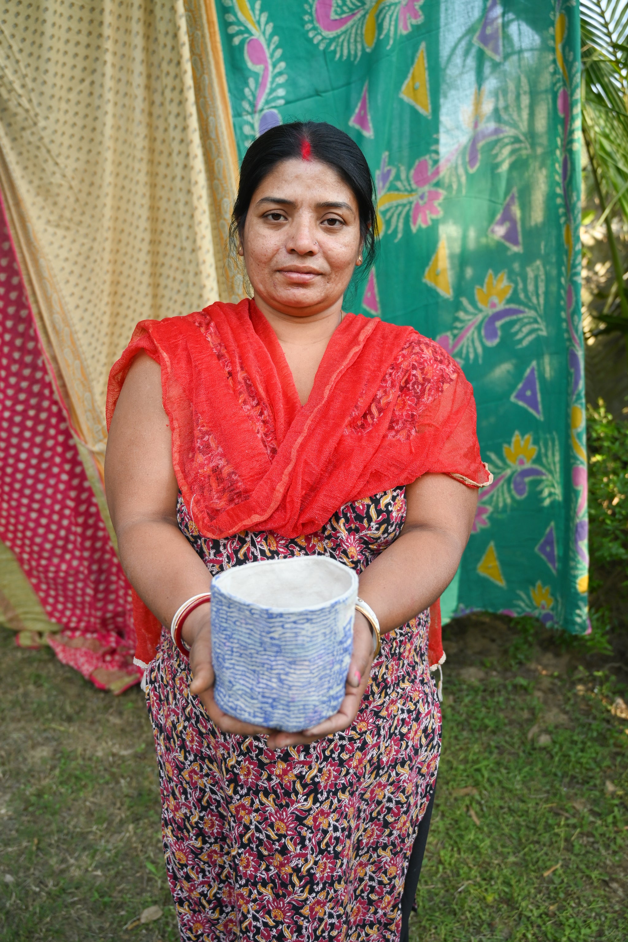 Vintage Kantha Basket featuring intricate, colorful stitching on bright saree patterns, perfect for holding essentials, plants, organizing your desk, or adding a touch of charm to any space.