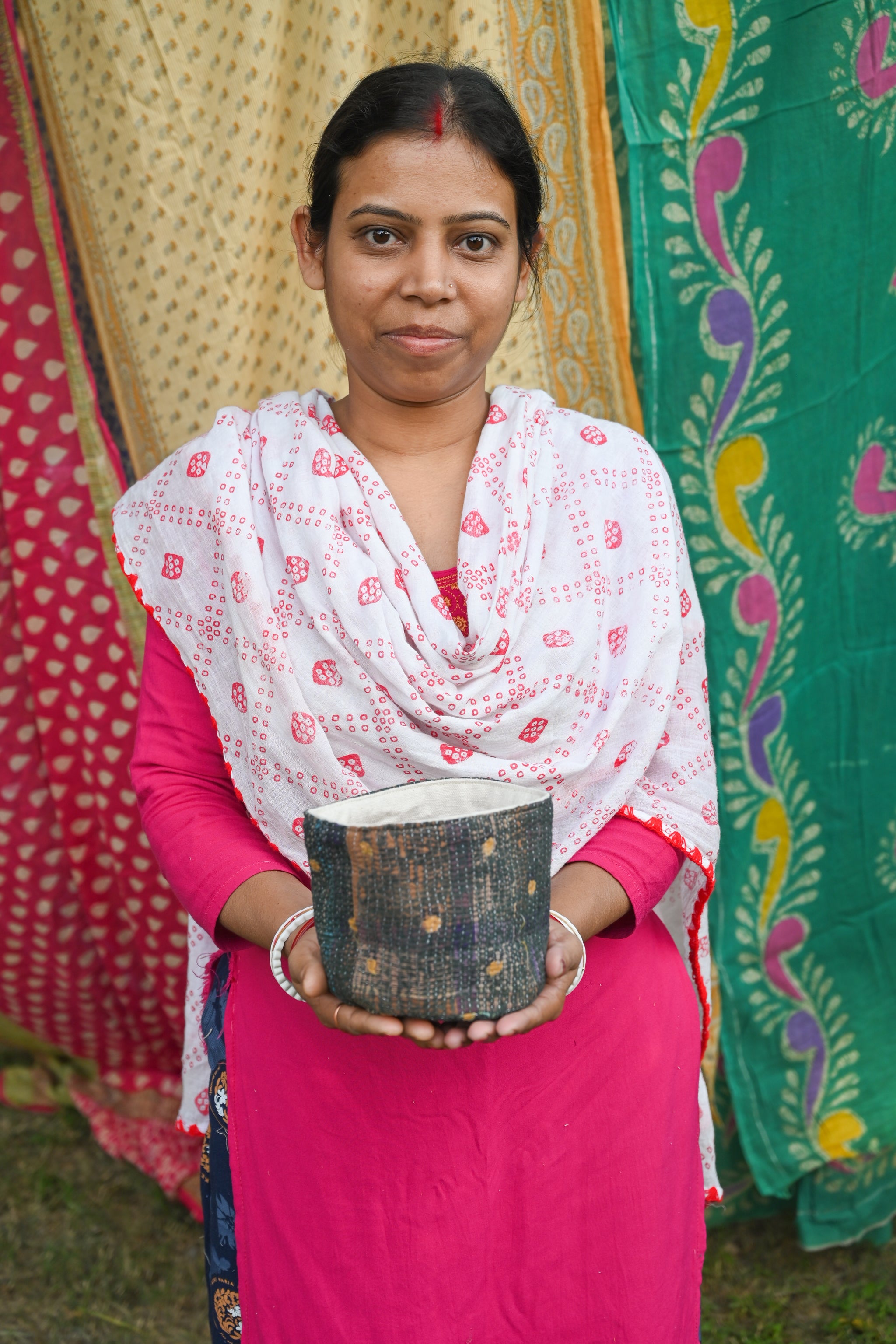 Vintage Kantha Basket featuring intricate, colorful stitching on bright saree patterns, perfect for holding essentials, plants, organizing your desk, or adding a touch of charm to any space.