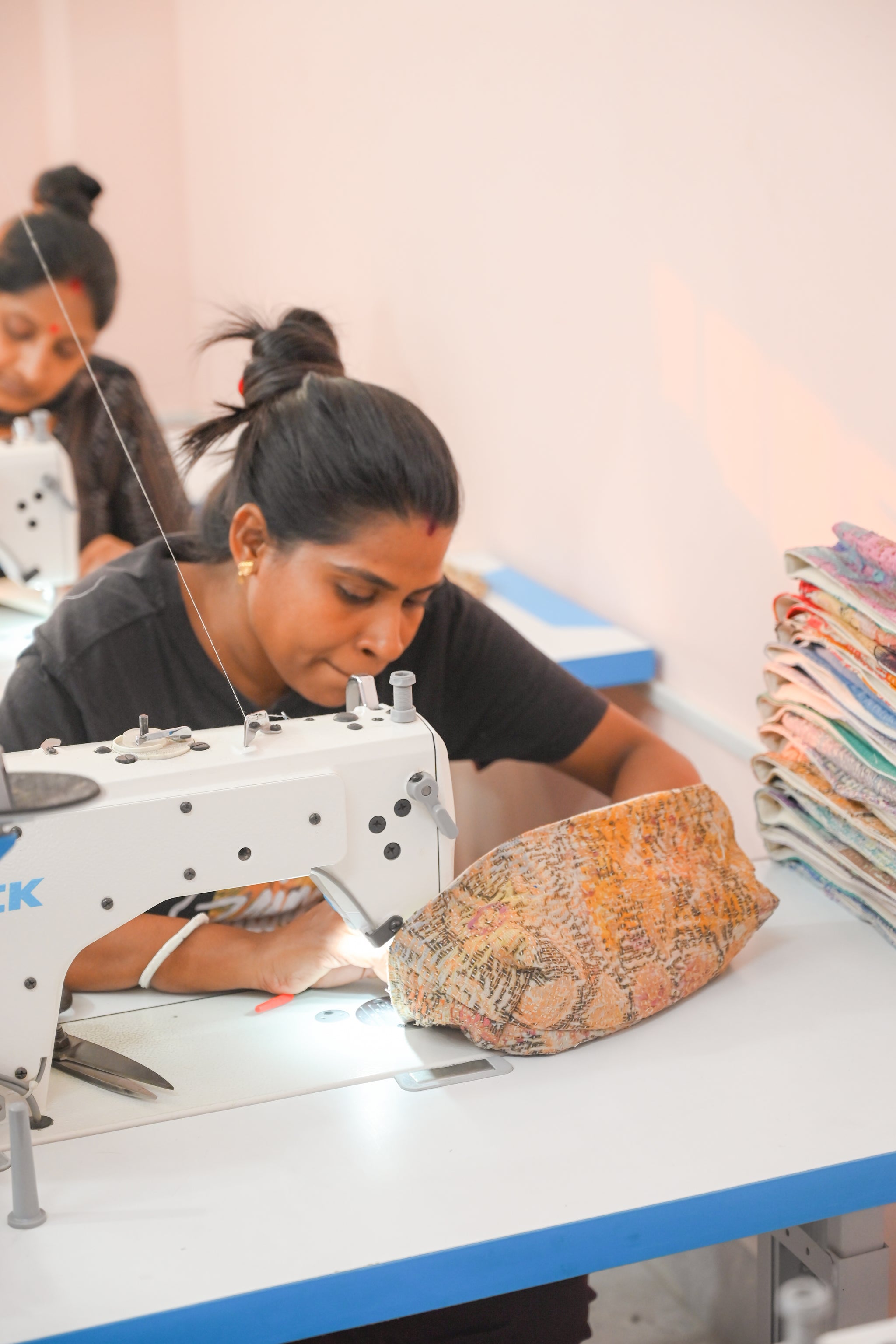 Vintage Kantha bread basket, handcrafted from eco-friendly fabric with vibrant, colorful stitching. The intricate Kantha embroidery features a mix of bold patterns and rich hues, making this basket both a functional and decorative piece. Perfect for serving bread, rolls, or storing small items, it adds a touch of rustic charm and handmade elegance to any kitchen or dining room