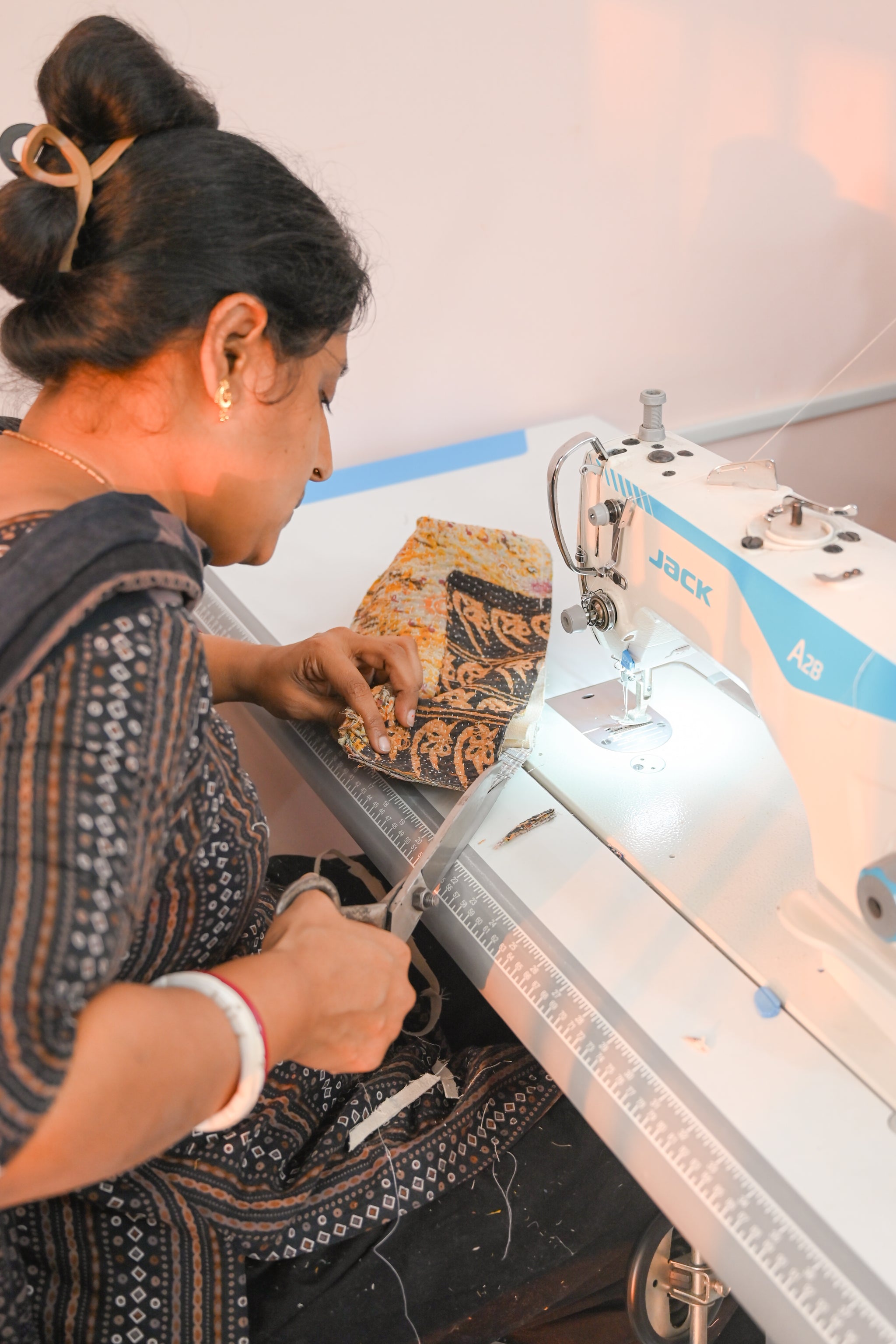 Vintage Kantha bread basket, handcrafted from eco-friendly fabric with vibrant, colorful stitching. The intricate Kantha embroidery features a mix of bold patterns and rich hues, making this basket both a functional and decorative piece. Perfect for serving bread, rolls, or storing small items, it adds a touch of rustic charm and handmade elegance to any kitchen or dining room