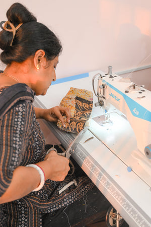 Vintage Kantha bread basket, handcrafted from eco-friendly fabric with vibrant, colorful stitching. The intricate Kantha embroidery features a mix of bold patterns and rich hues, making this basket both a functional and decorative piece. Perfect for serving bread, rolls, or storing small items, it adds a touch of rustic charm and handmade elegance to any kitchen or dining room