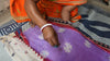 Female artisan working on her kantha stitching for our Kantha dish cloths, blankets, towels, aprons and more!