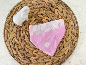 a basket with a cloth and a napkin on it