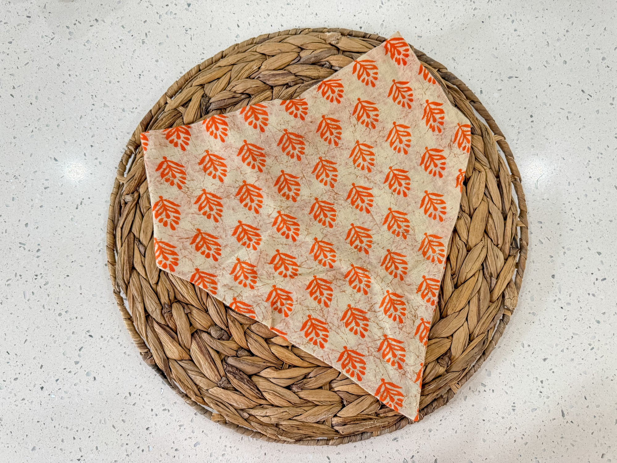 a basket with a napkin on top of it