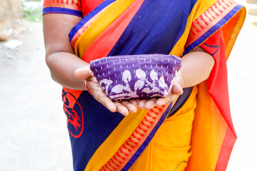 Handmade small Kantha cosmetic bag with vibrant saree patterns, perfect for fitting all your to-go items in one stylish, spacious bag for travel or daily use.
