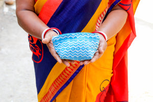 Handmade small Kantha cosmetic bag with vibrant saree patterns, perfect for fitting all your to-go items in one stylish, spacious bag for travel or daily use.