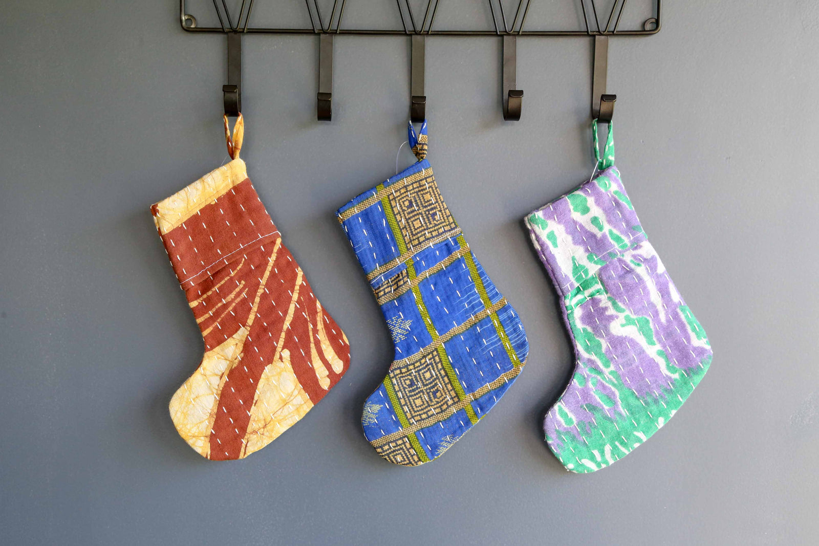 Handmade mini Kantha stocking with vibrant saree patterns, perfect for your little one, pet, or gifting small items, adding a unique touch to holiday decor