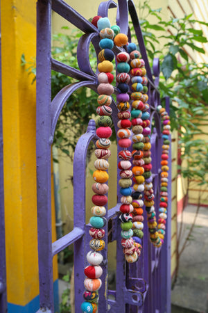 Hand-stitched Saree Bead Garland with vibrant multicolored beads, perfect for home decor, festive decorations, and adding a touch of elegance to your living room or windows