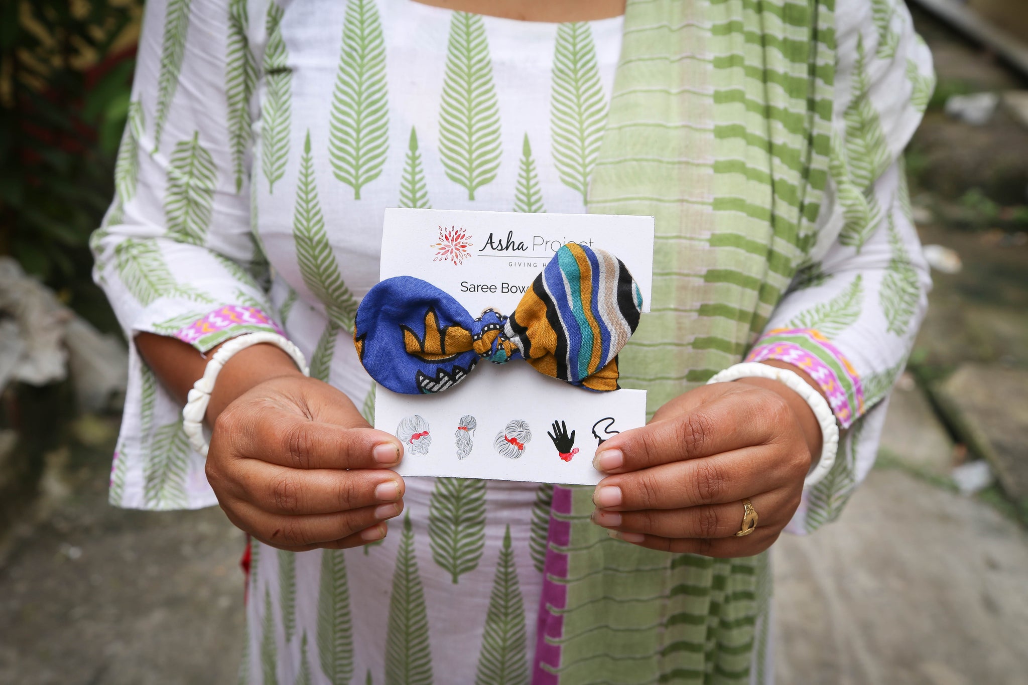 Handmade saree bow hair scarf featuring vibrant fabric patterns, perfect for adding a stylish and unique touch to your hair, whether worn as a headband or scarf