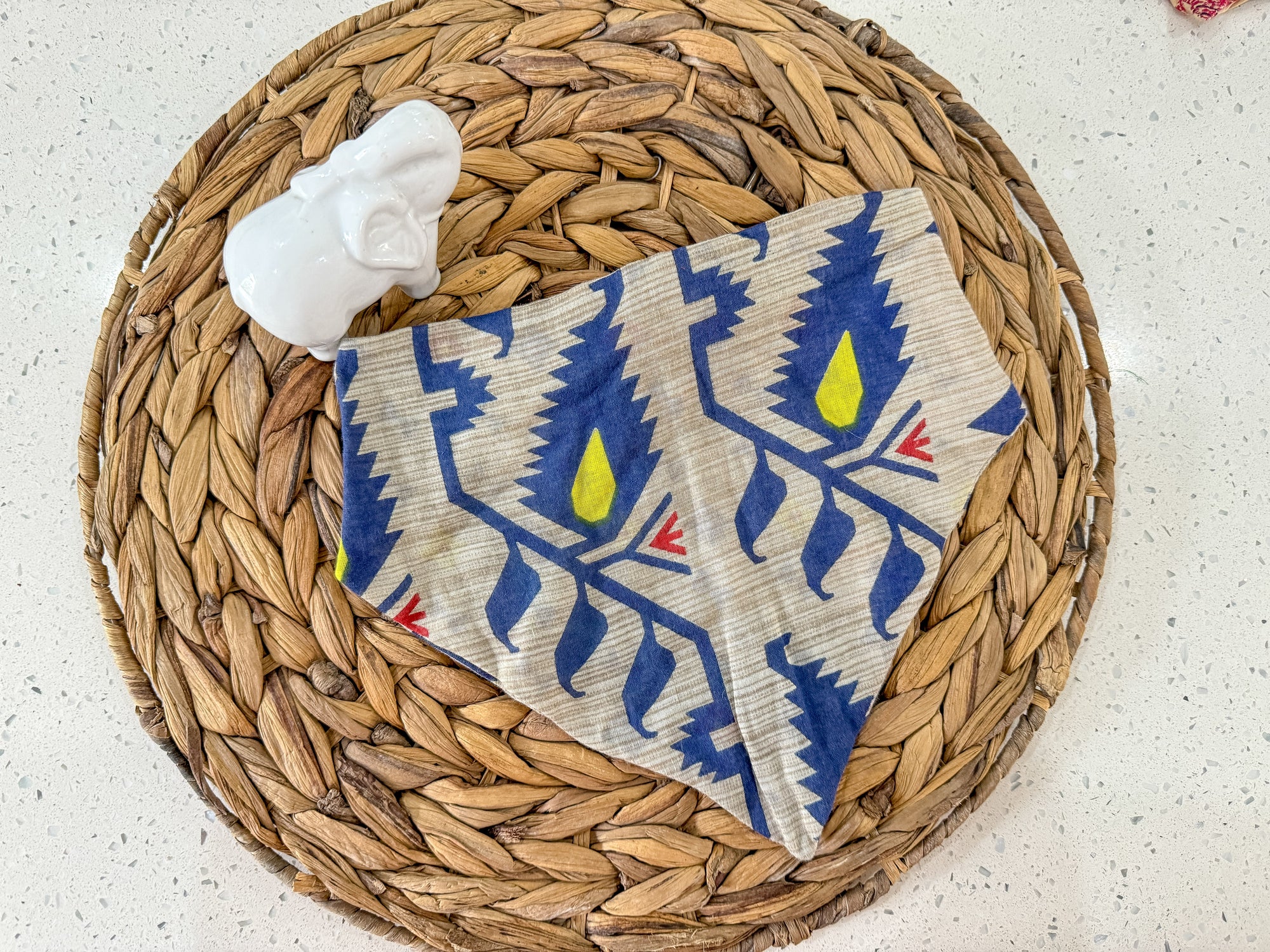 a basket with a cloth and a napkin on it